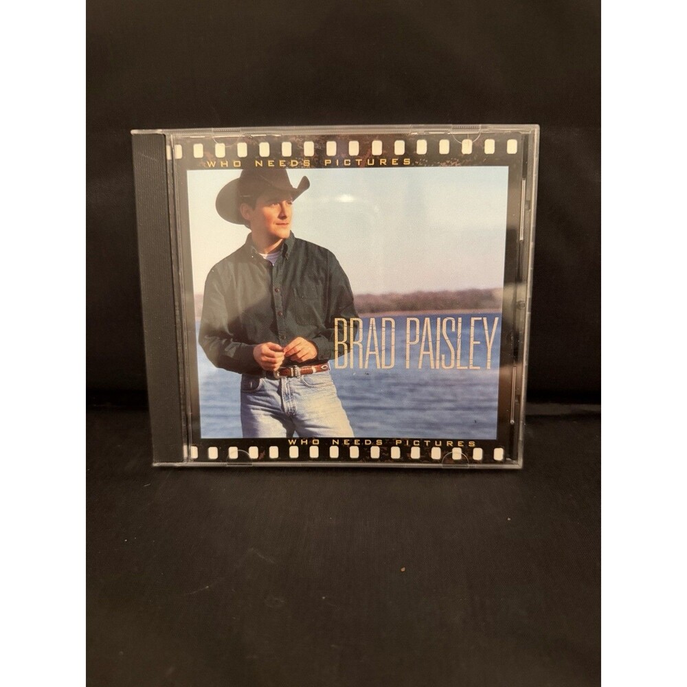 Brad Paisley Who Needs Pictures CD He Didn’t Have To Be Holdin On To You